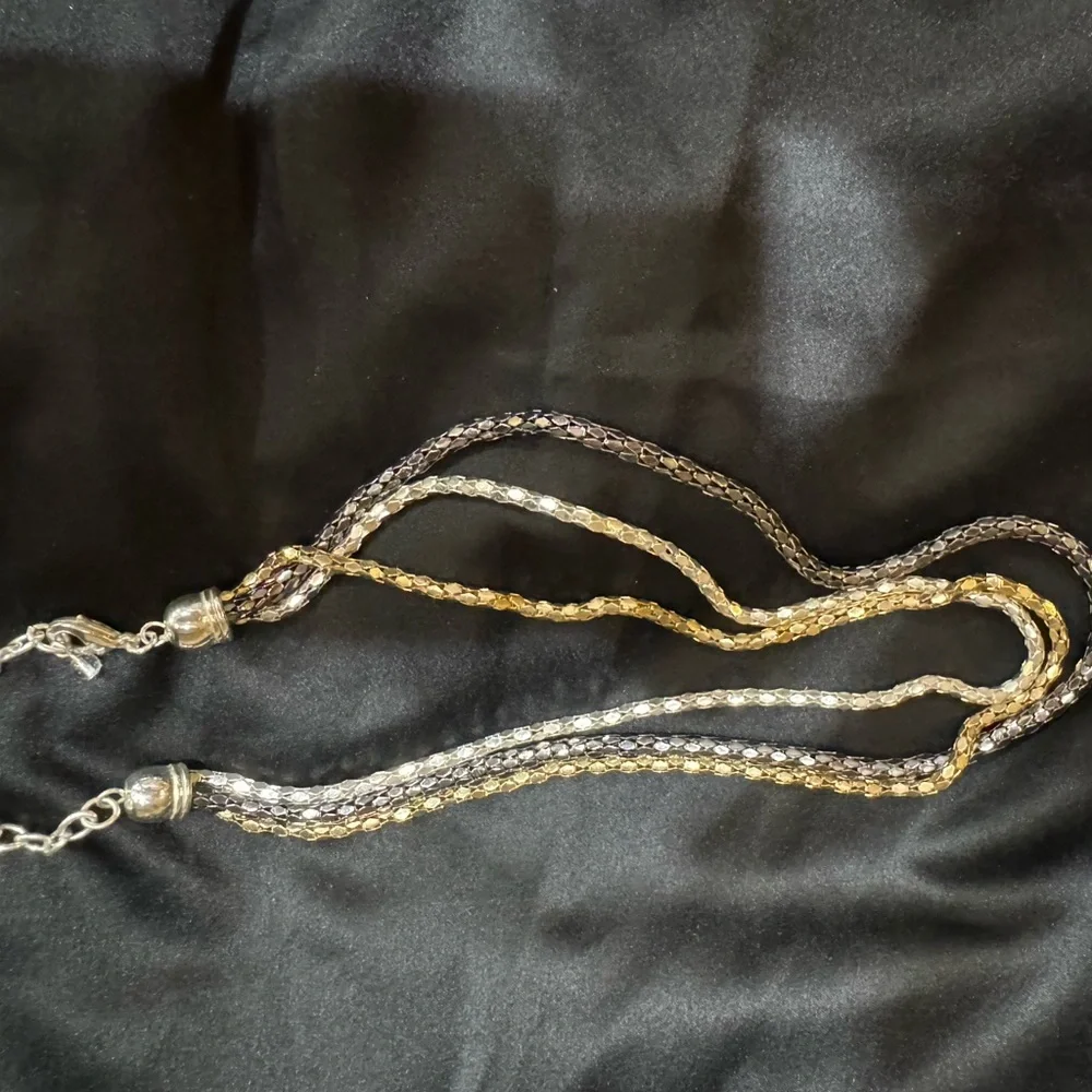 Necklace 3 Strand looks like Gold Silver Platinum. 16 to 20 in adjustabl…